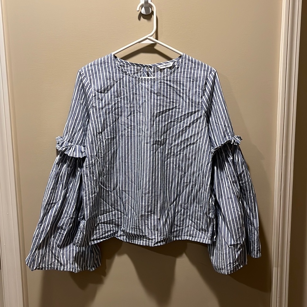 Long sleeved, blue and white striped blouse